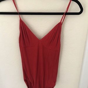 Sofia bodysuit in chili red.